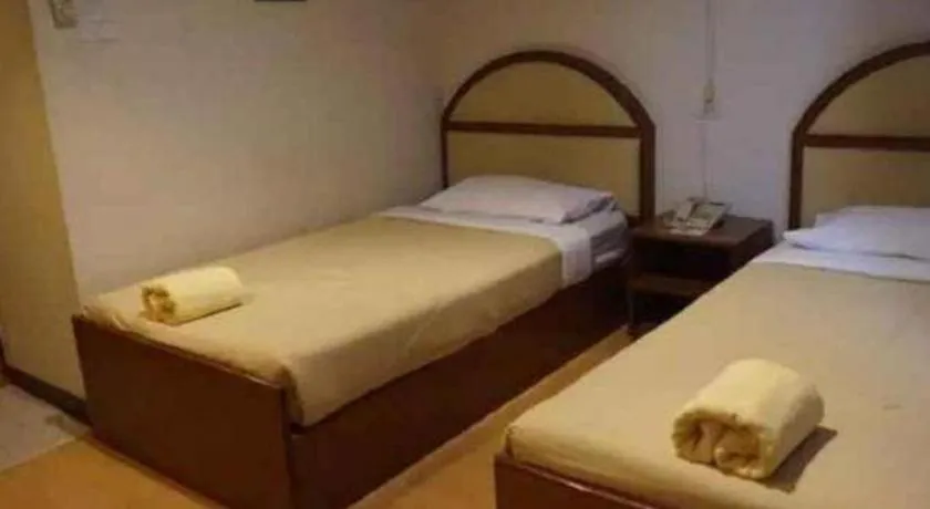 Bed in Supak Hotel