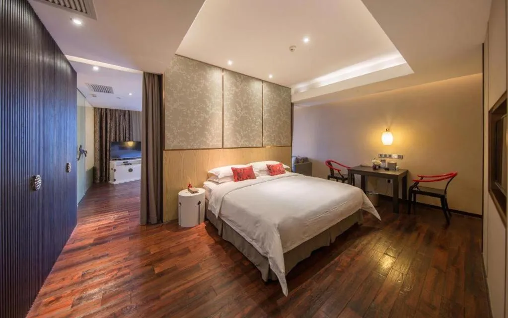 Bed in DongGuan JOYC Hotel 