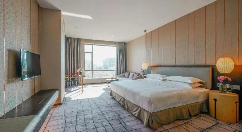 Bed in DongGuan JOYC Hotel 