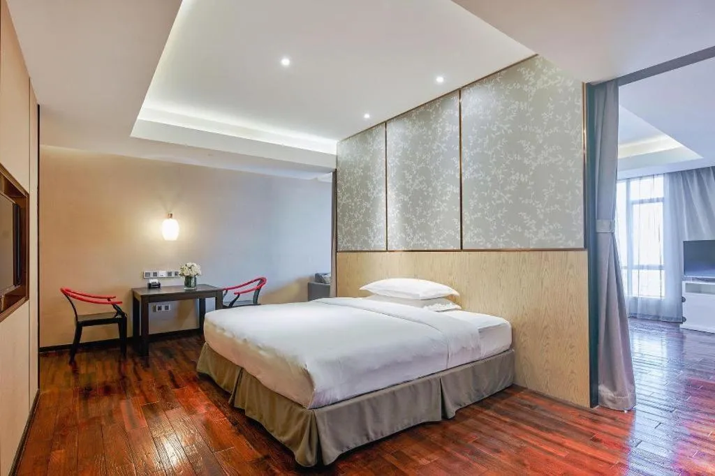 Bed in DongGuan JOYC Hotel 