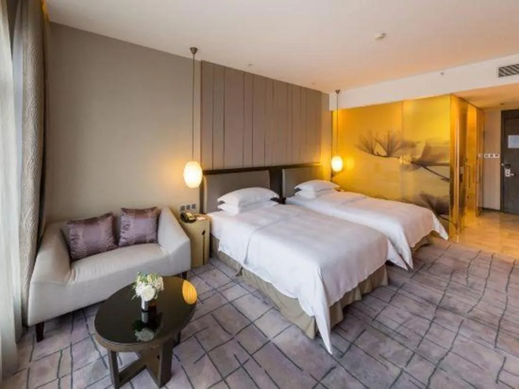 Bed in DongGuan JOYC Hotel 