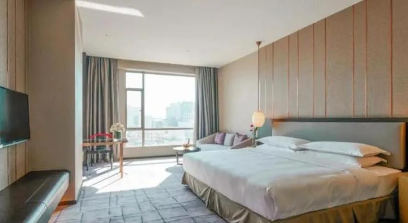 Bed in DongGuan JOYC Hotel 