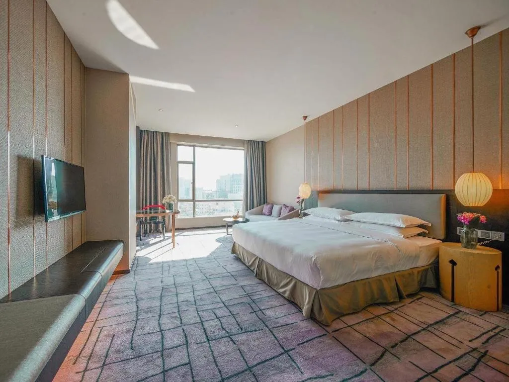 Bed in DongGuan JOYC Hotel 