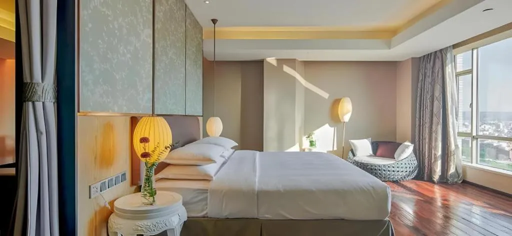 Bed in DongGuan JOYC Hotel 