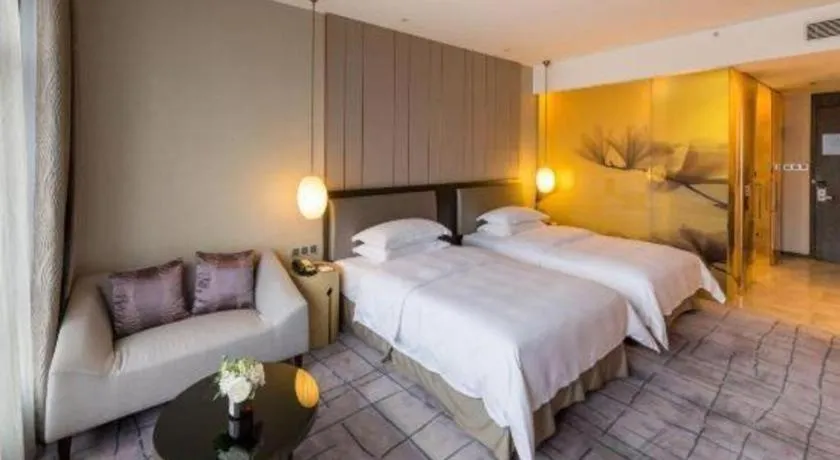 Bed in DongGuan JOYC Hotel 