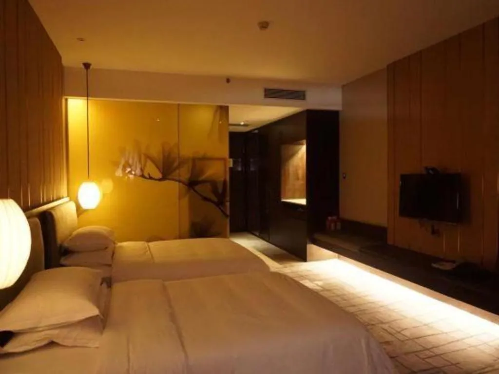 Bed in DongGuan JOYC Hotel 