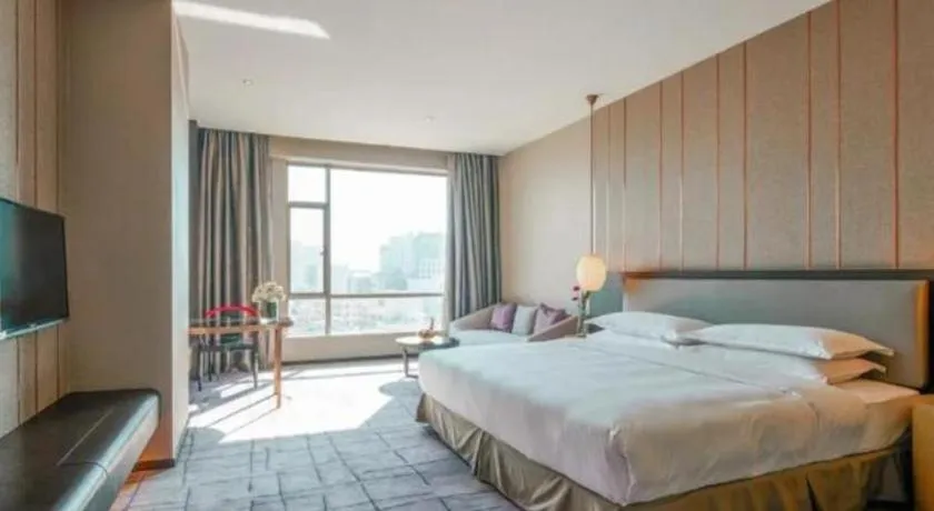 Bed in DongGuan JOYC Hotel 