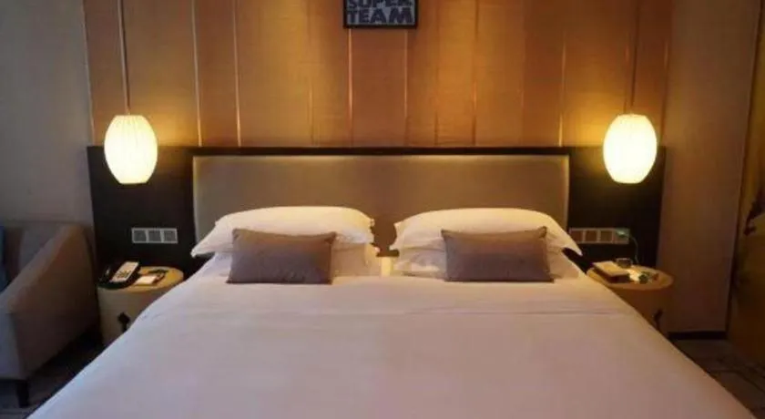 Bed in DongGuan JOYC Hotel 