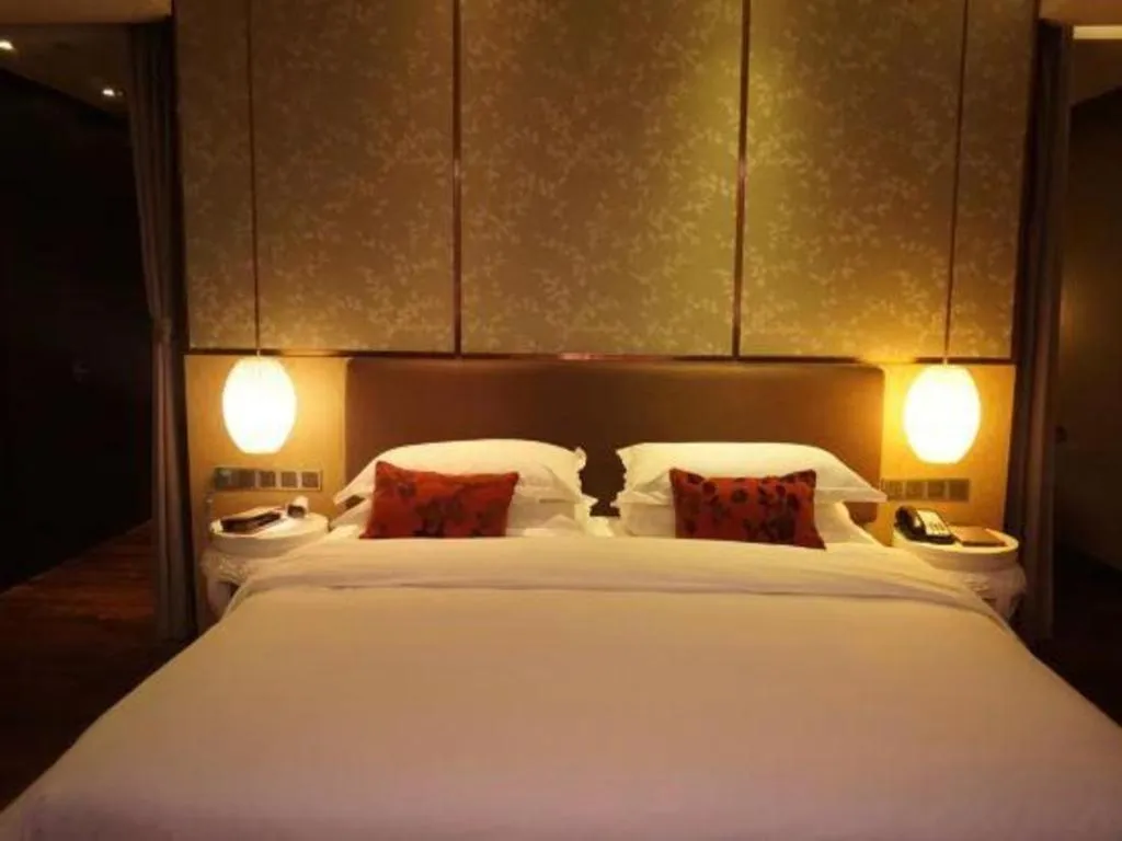 Bed in DongGuan JOYC Hotel 