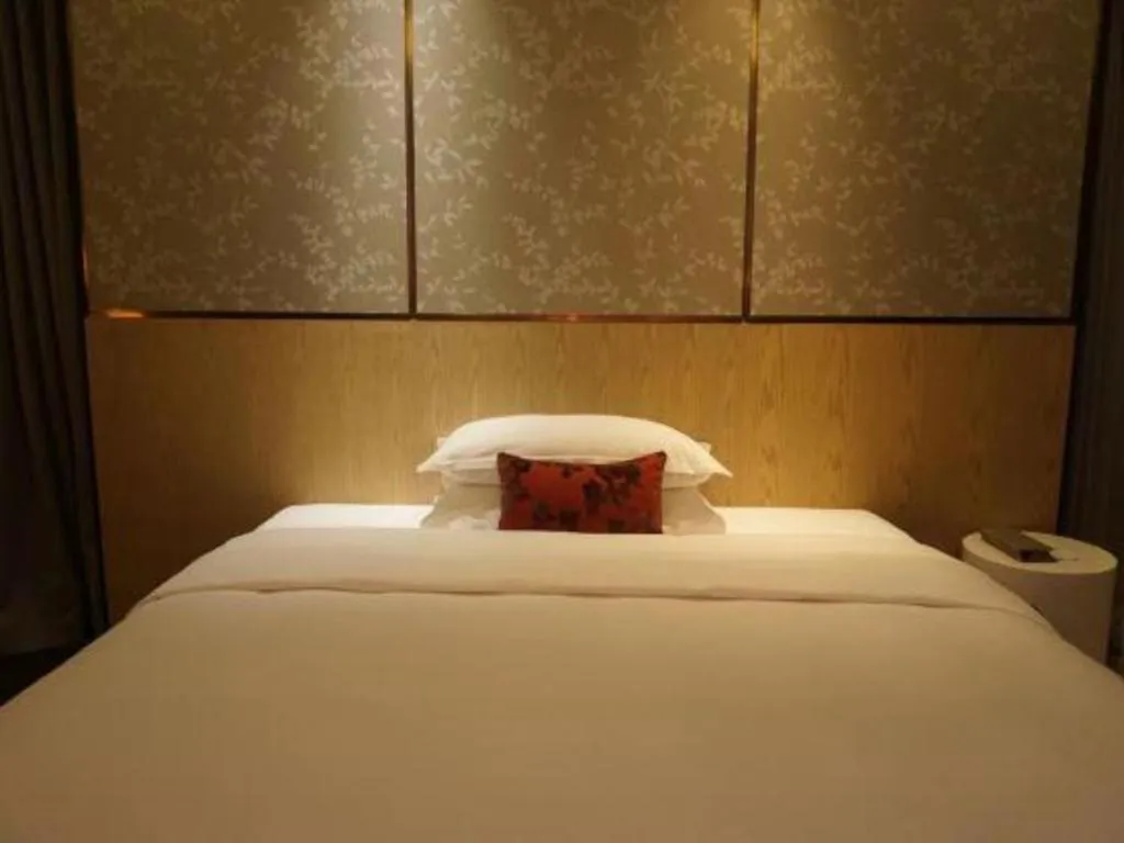 Bed in DongGuan JOYC Hotel 