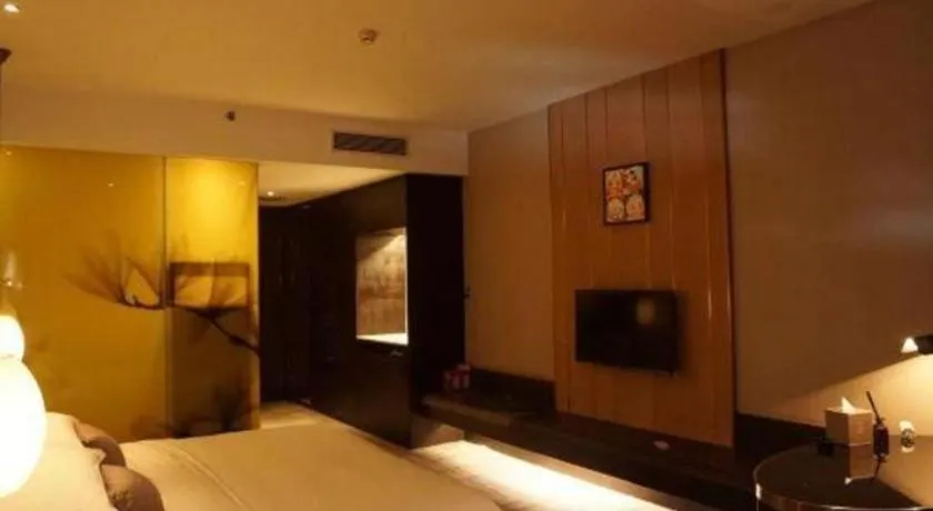 Bed in DongGuan JOYC Hotel 