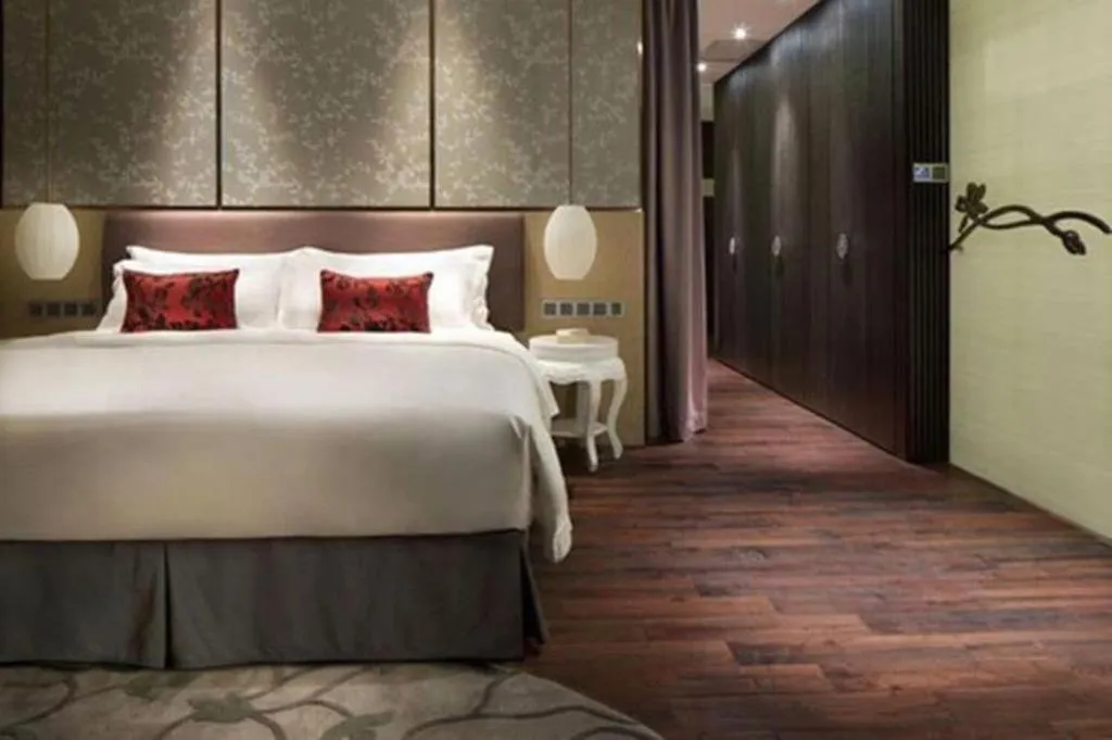 Bed in DongGuan JOYC Hotel 