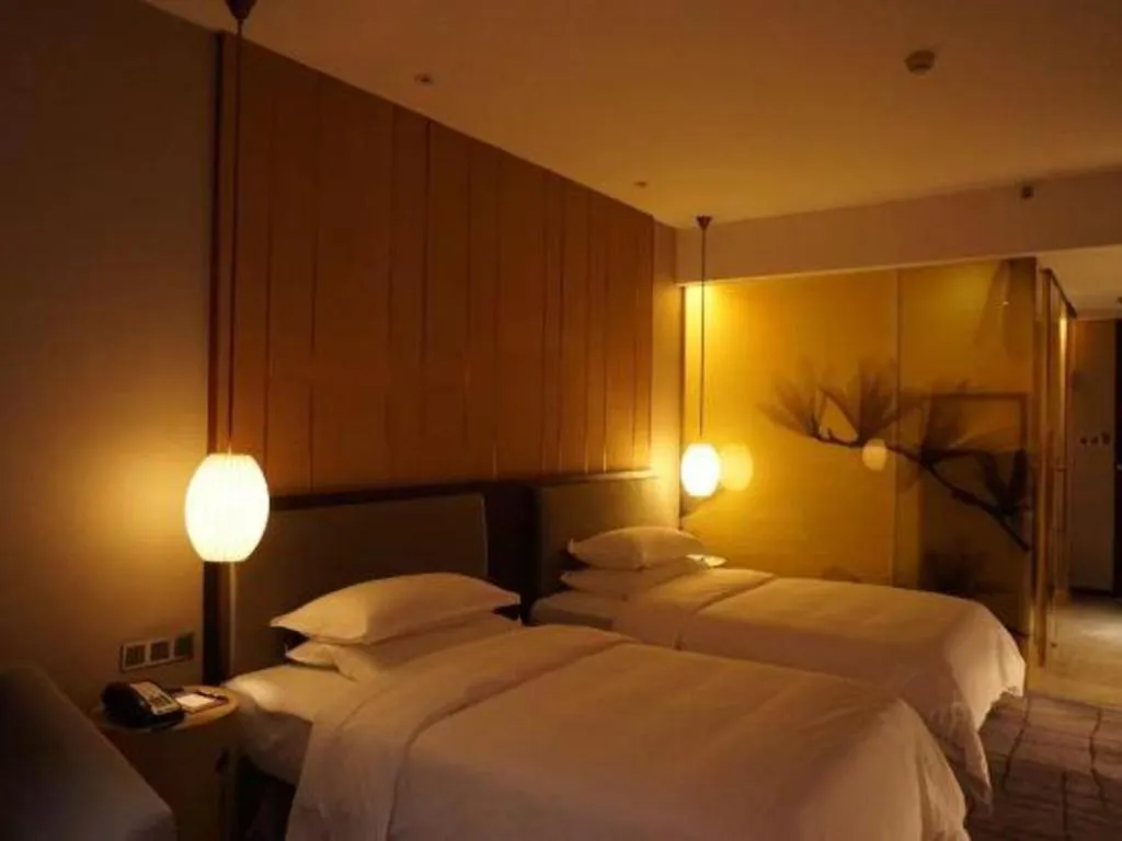 Bed in DongGuan JOYC Hotel 