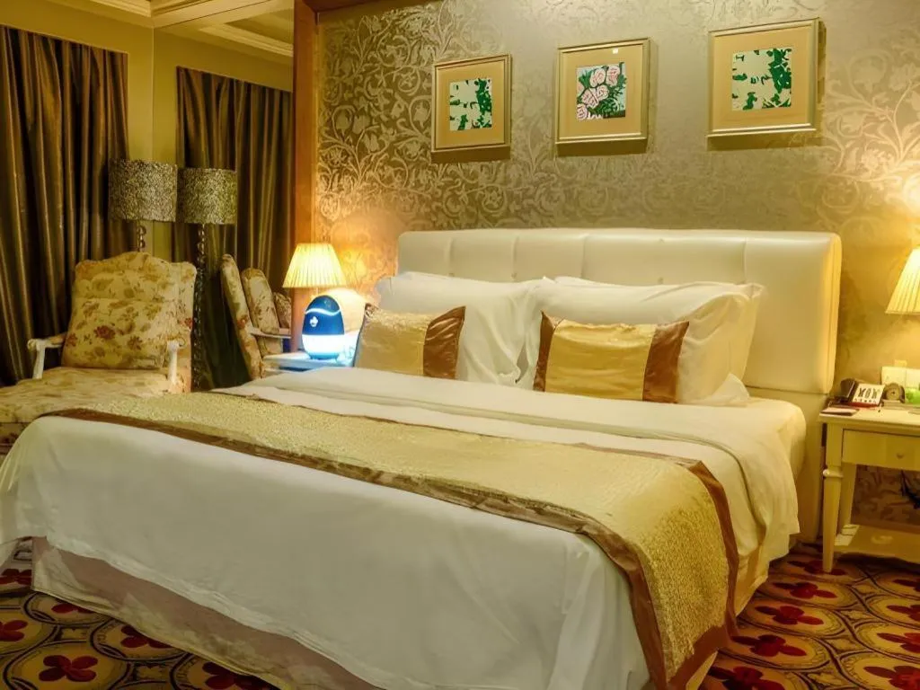 Bed in Eurasia International Hotel