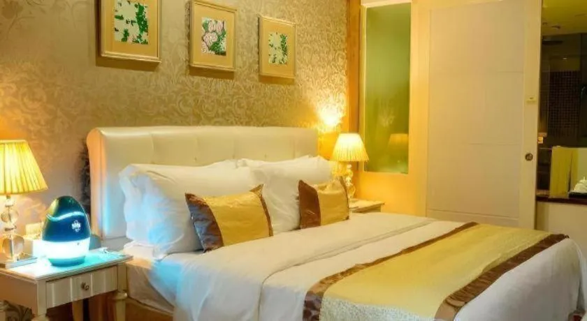 Bed in Eurasia International Hotel