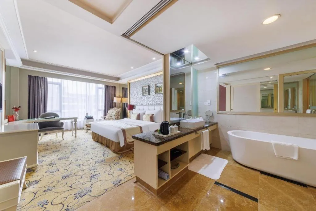 Bed in Eurasia International Hotel