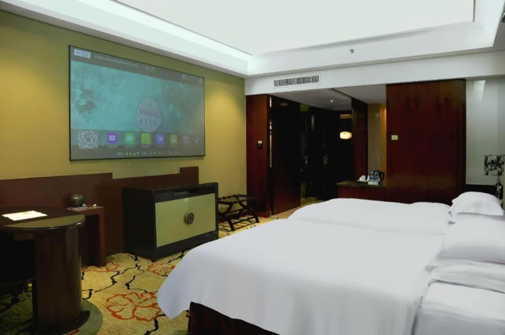 Bed in Eurasia International Hotel