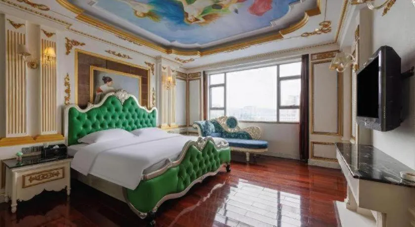 Bed in Eurasia International Hotel