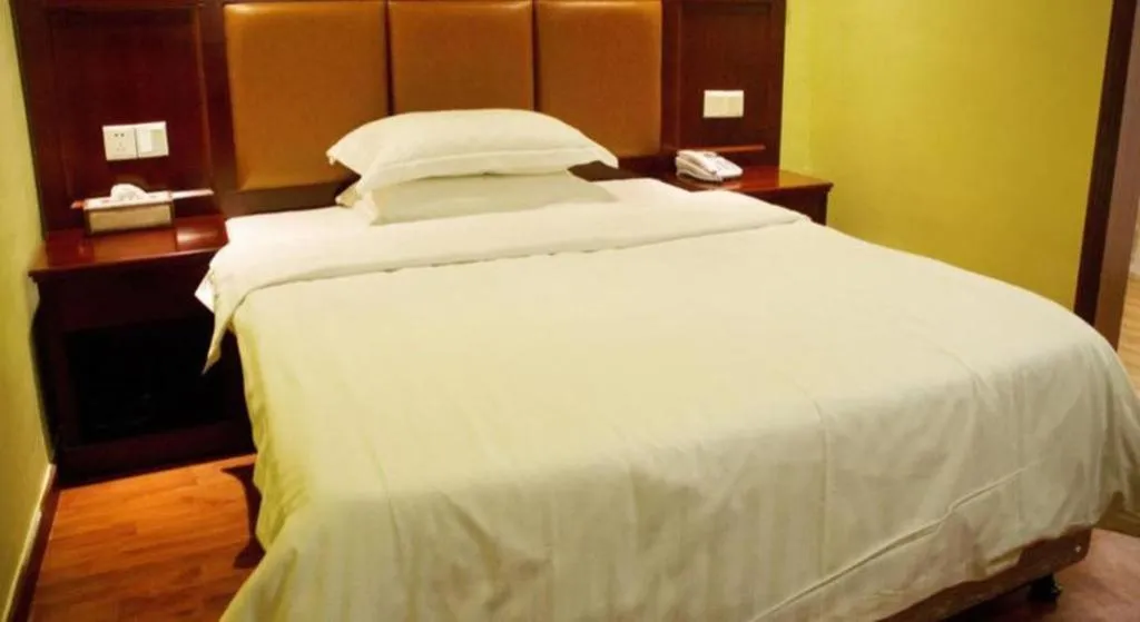 Bed in Eurasia International Hotel