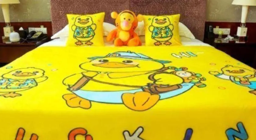 Bed in Eurasia International Hotel