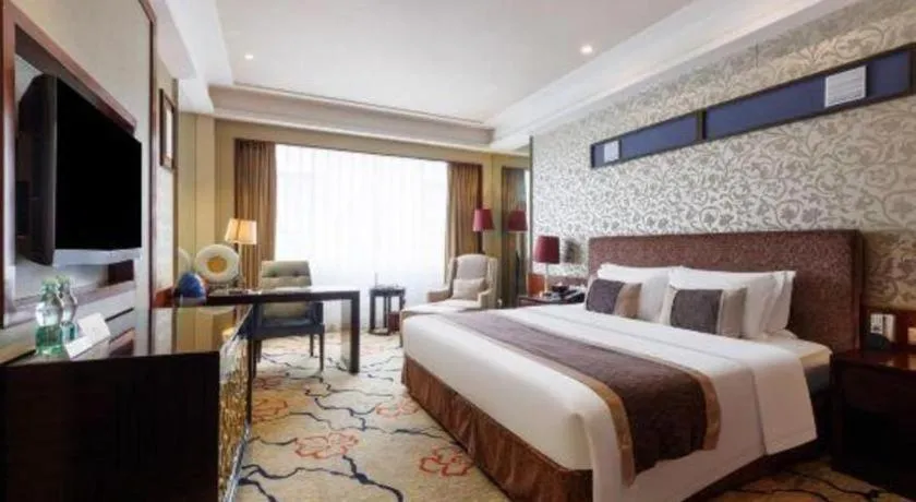 Bed in Eurasia International Hotel