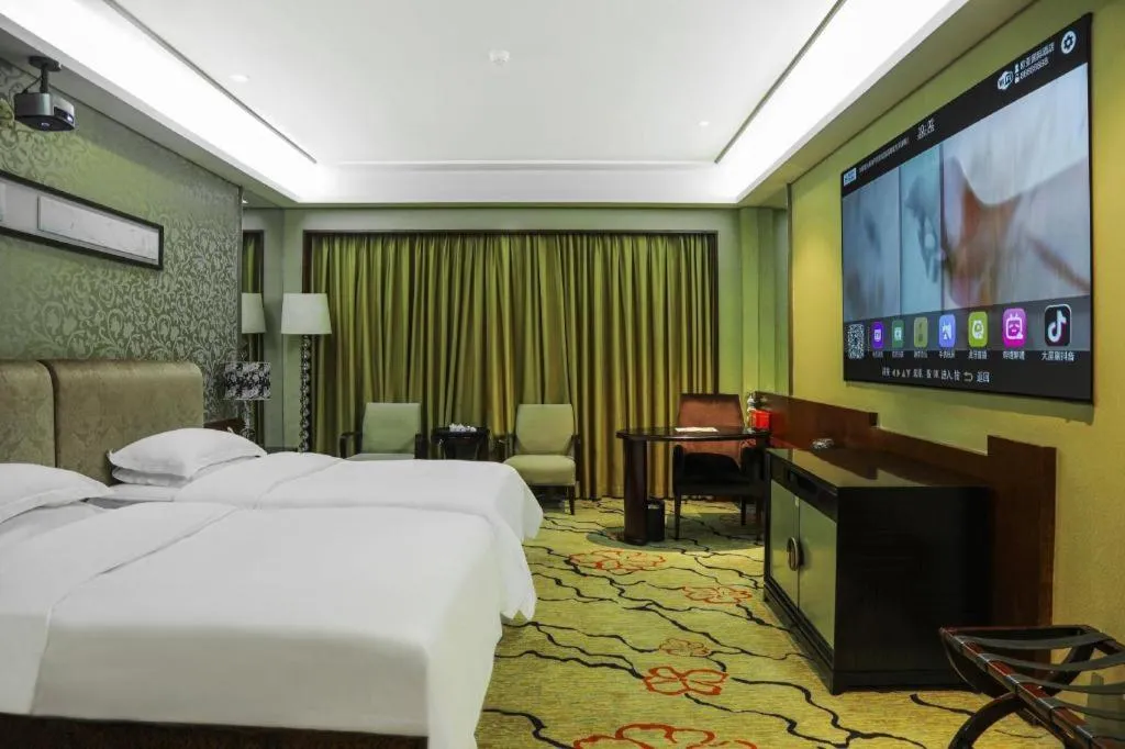 Bed in Eurasia International Hotel