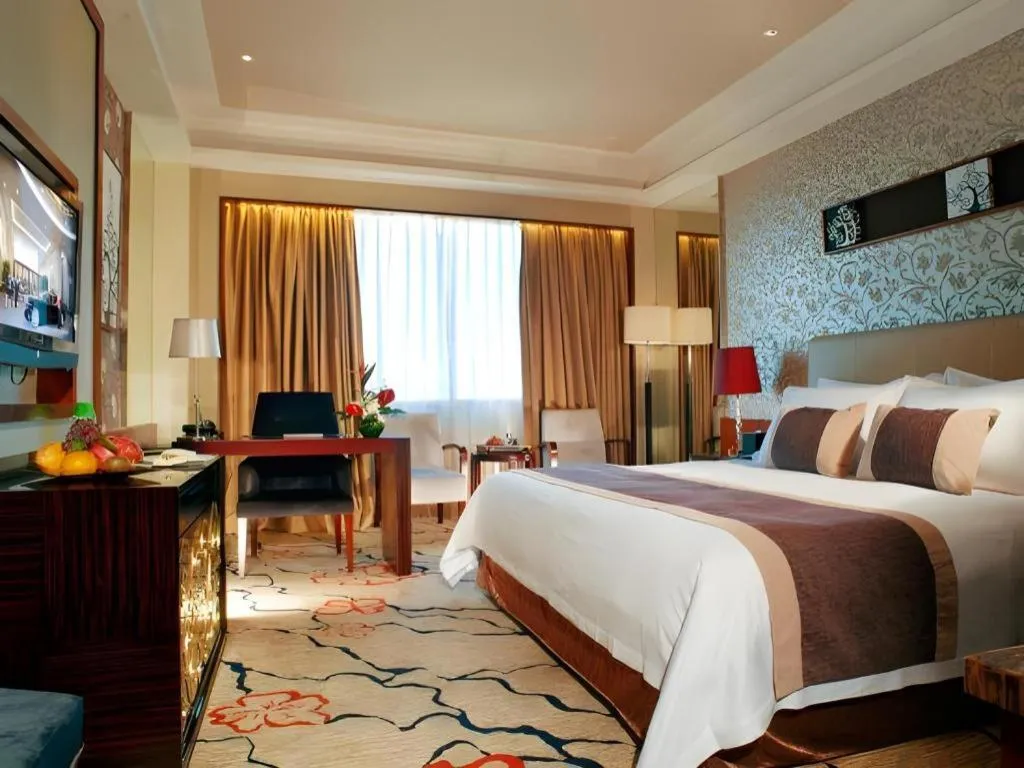 Bed in Eurasia International Hotel