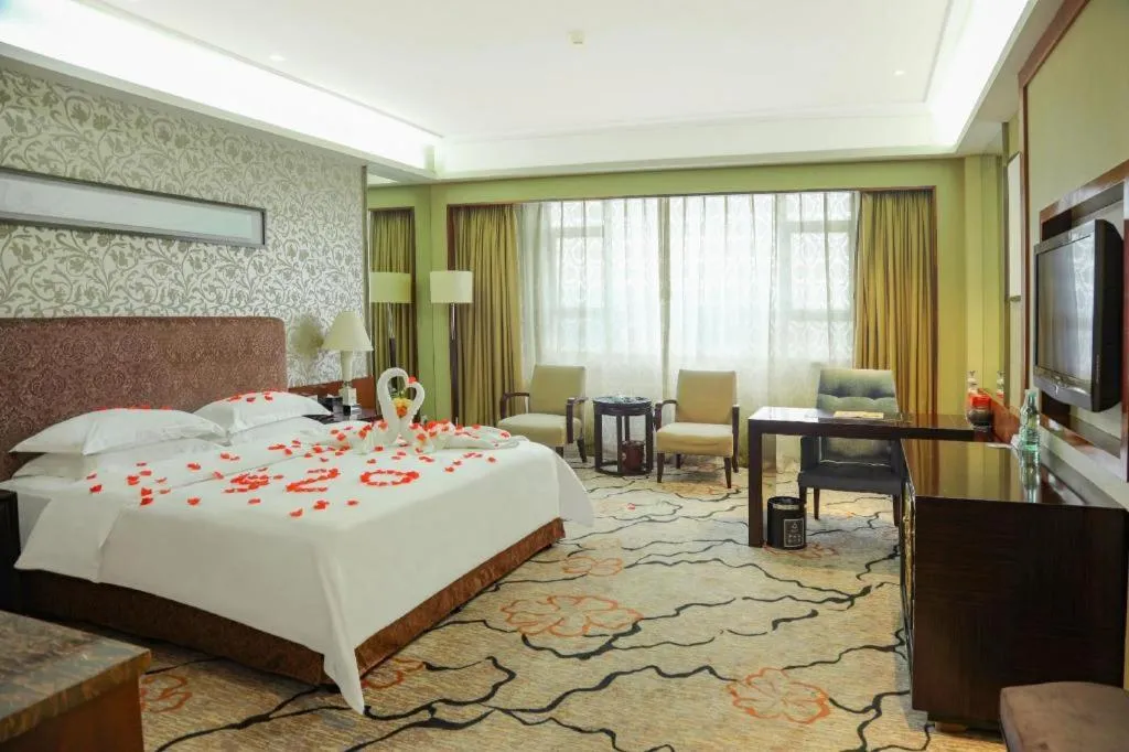 Bed in Eurasia International Hotel