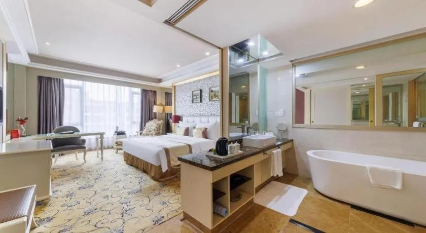 Bed in Eurasia International Hotel