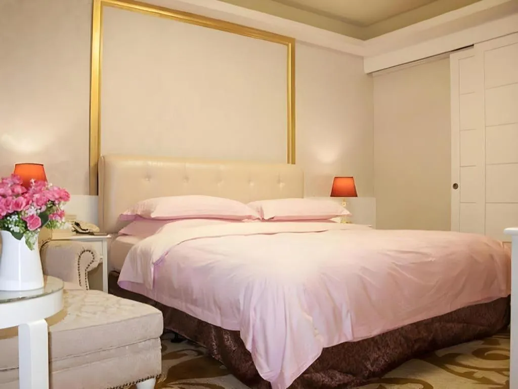 Bed in Eurasia International Hotel