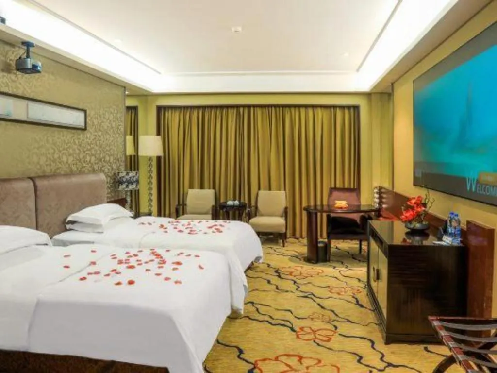 Bed in Eurasia International Hotel