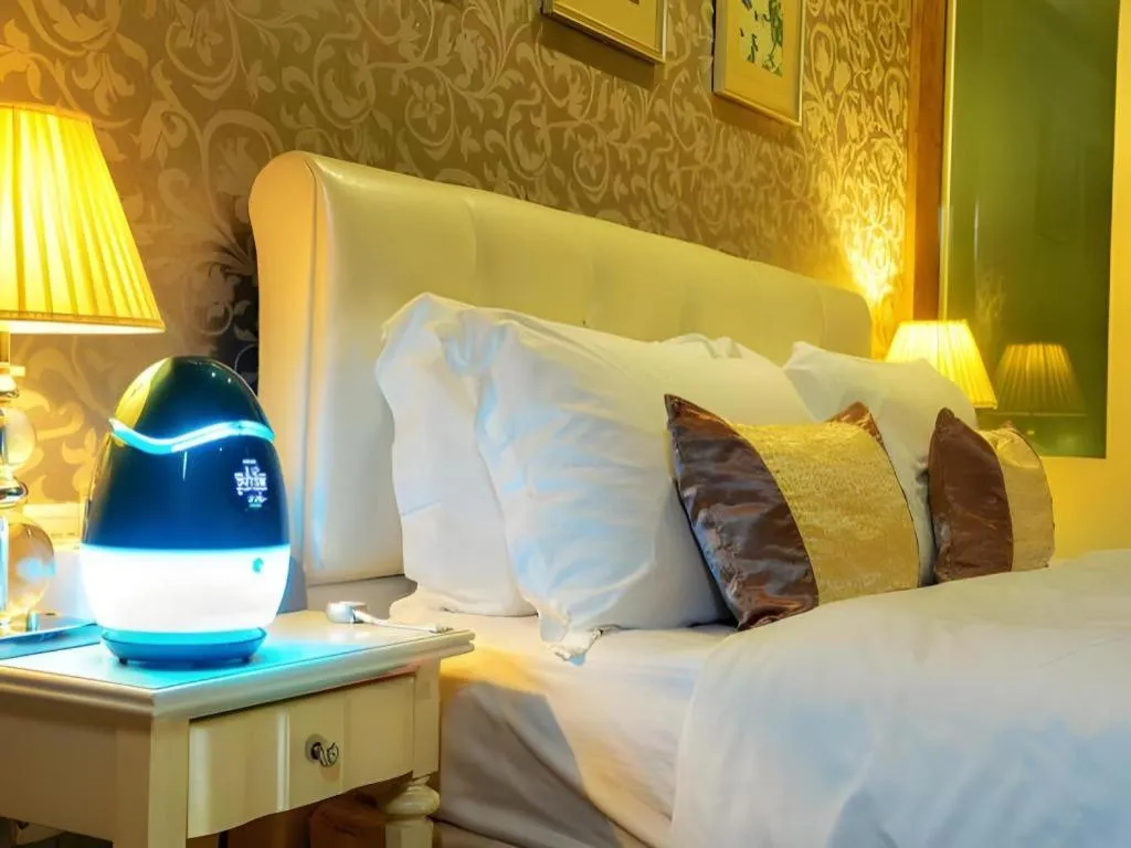 Bed in Eurasia International Hotel