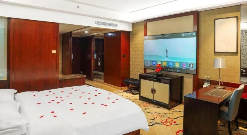 Bed in Eurasia International Hotel