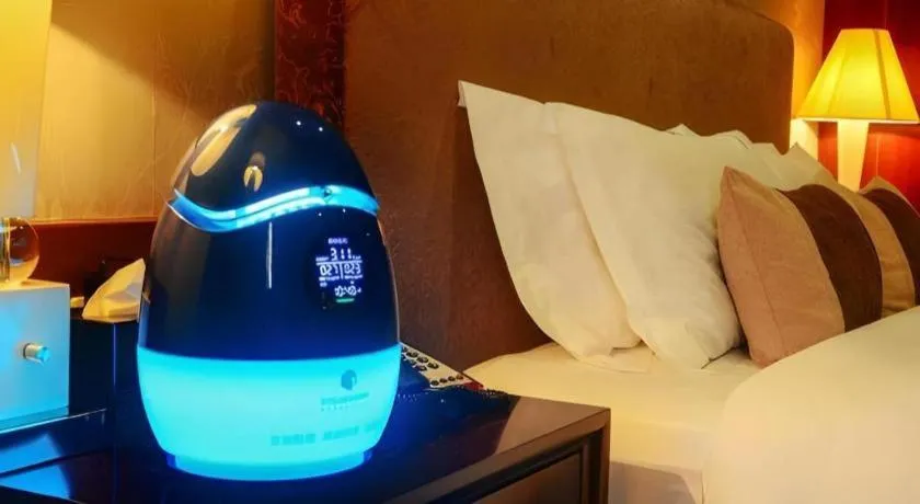 Bed in Eurasia International Hotel