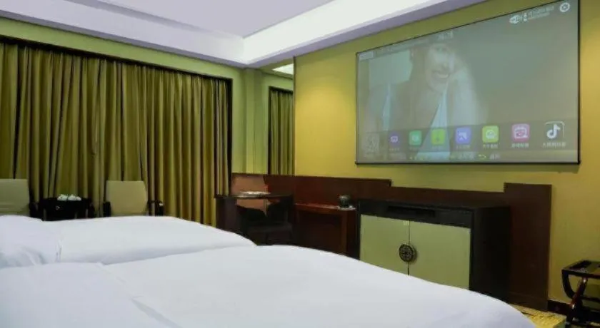 Bed in Eurasia International Hotel