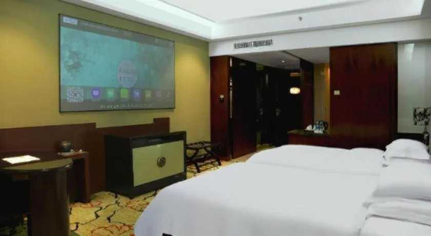 Bed in Eurasia International Hotel