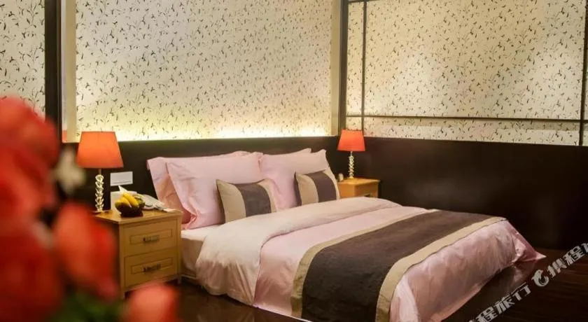 Bed in Eurasia International Hotel