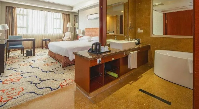 Bed in Eurasia International Hotel