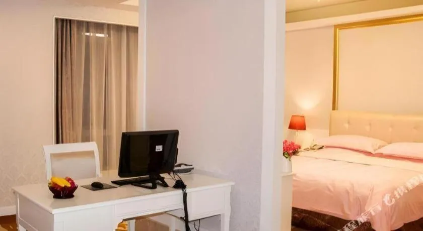 Bed in Eurasia International Hotel