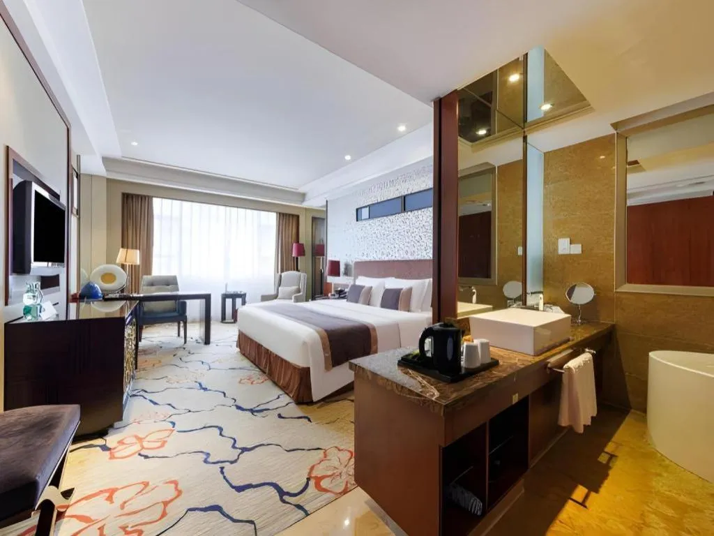 Bed in Eurasia International Hotel