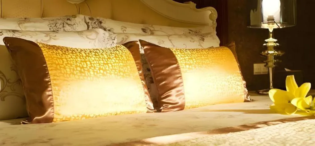 Bed in Eurasia International Hotel