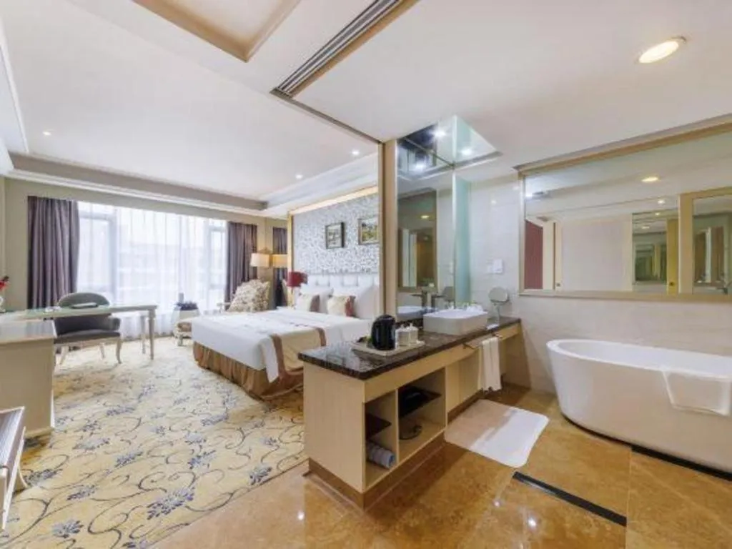 Bed in Eurasia International Hotel