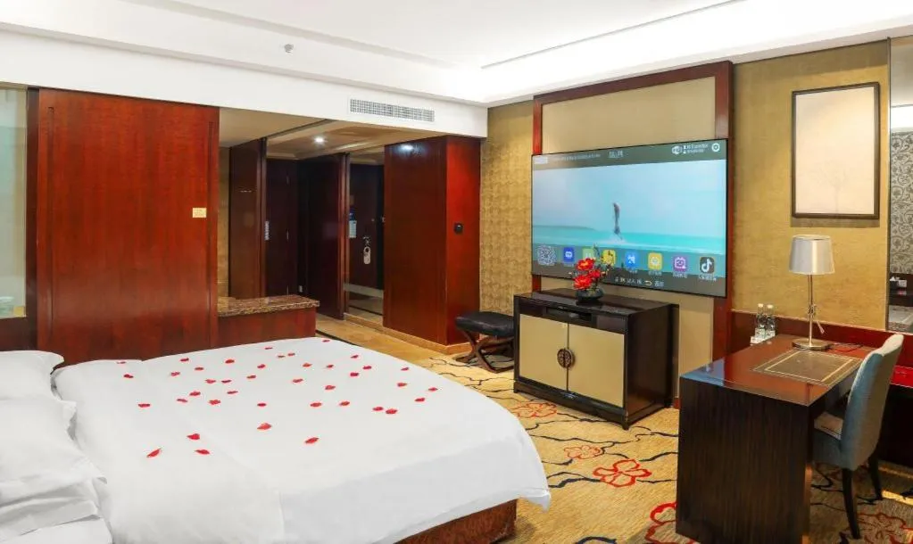 Bed in Eurasia International Hotel