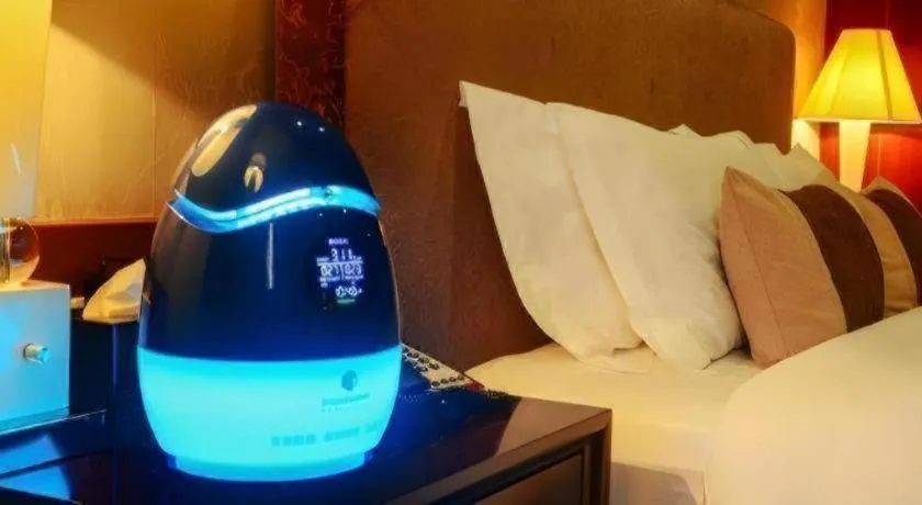 Bed in Eurasia International Hotel