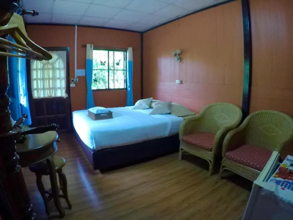 Bed in Chiangsan Goldenland Resort