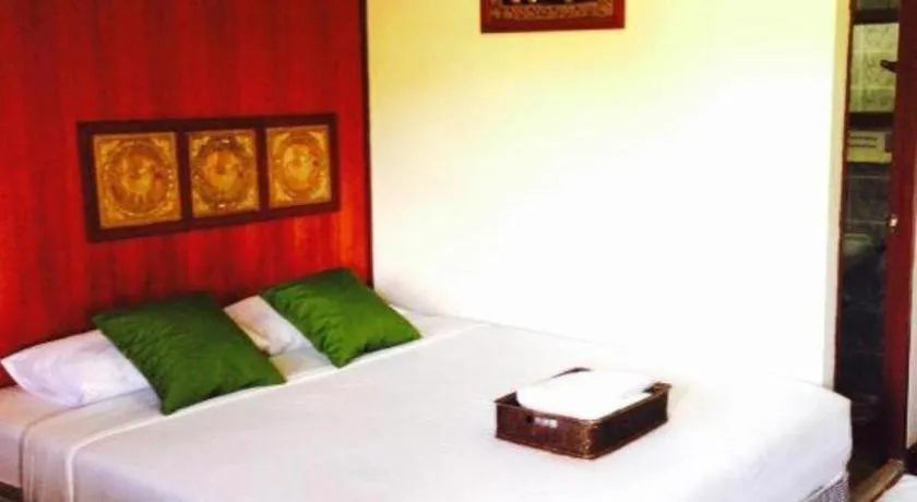 Bed in Chiangsan Goldenland Resort