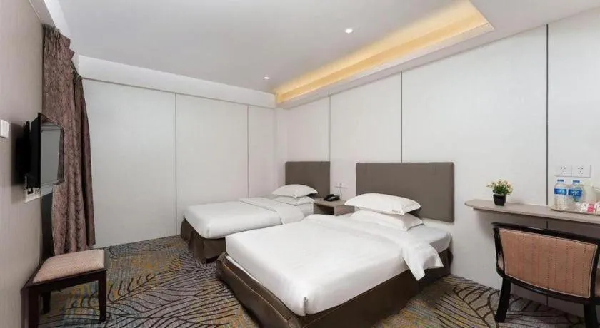 Bed in Renhe Good East Hotel