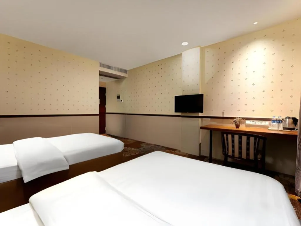 Bed in Renhe Good East Hotel