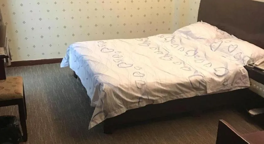 Bed in Renhe Good East Hotel