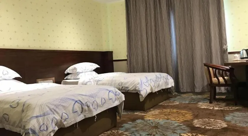 Bed in Renhe Good East Hotel